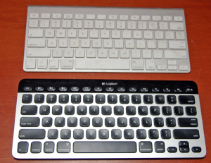 Logitech K811 Keyboard and Apple Wireless Keyboard