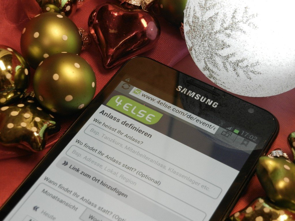 Smartphone Next to Holiday Ornaments
